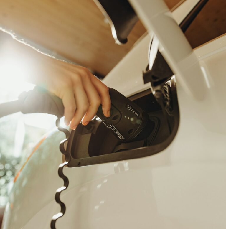 Electric vehicle charging cable being connected