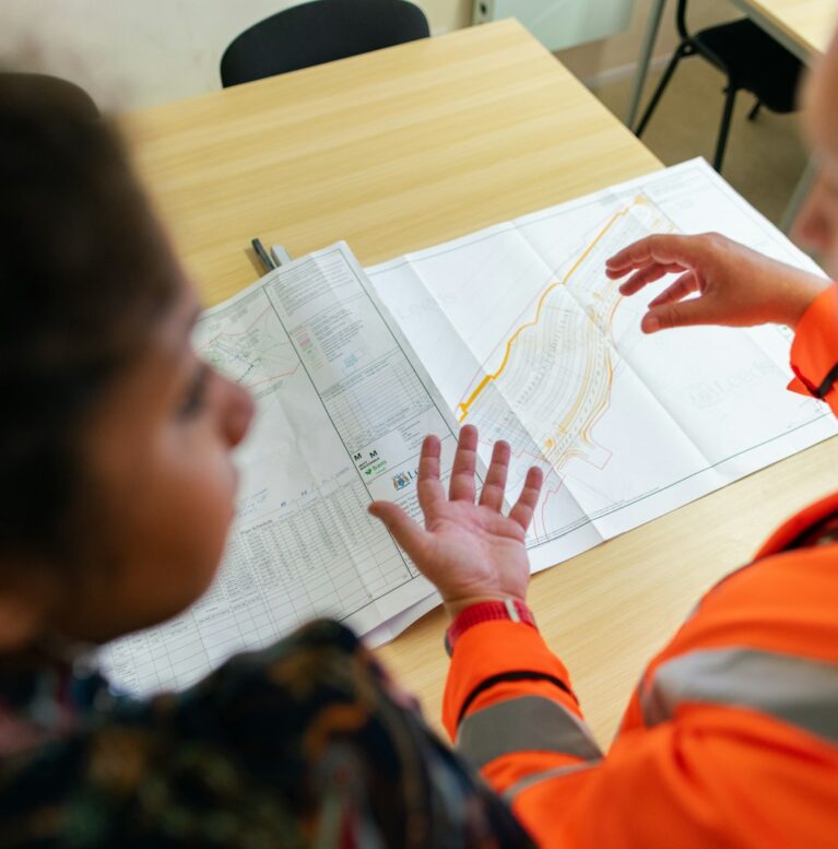 Colleagues working through project figures